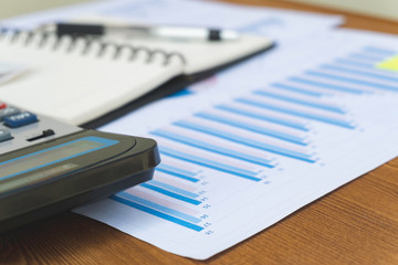 notebook and pen on the table