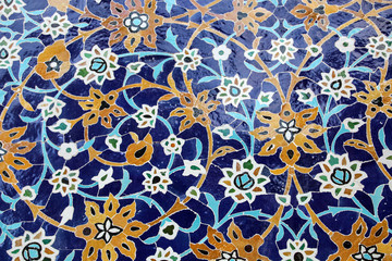 Colorful mosaic and ceramic tiles in the traditional Persian style on the wall Tomb of Sheikh Safi al-Din, Ardabil, northern Iran.