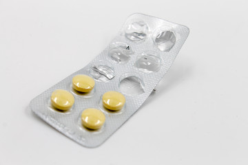 pills in blister isolated on white background