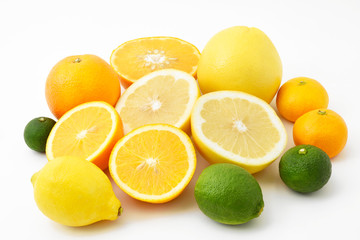 Mixed citrus fruits including lemon, lime, grapefruits, oranges, satsuma oranges, yuzu and sudachi	