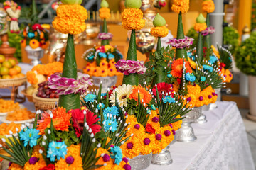 The Sacrifice objects set for the Thai filming project. They prepare in front of the spiritual landlord statue and asking for the successful project.