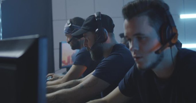Young men playing at a gaming tournament