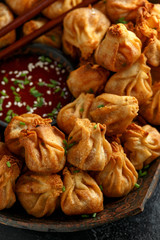 Chinese takeaway finger food Vegetable wontons with sweet chilli dip sauce