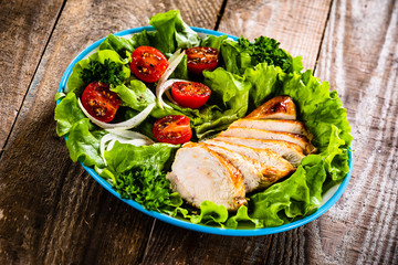 Caesar salad on wooden table