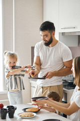 young father has prepared breakfast for her wife and children, close up photo. household chores - 292549595