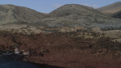landscape and sunset on the coast contemplating the breaking of the waves on the cliffs