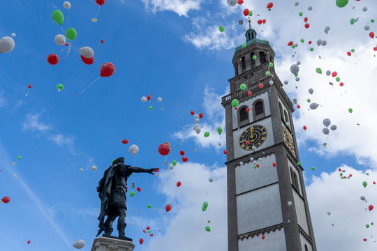 Turamichele celebration with ballons in front of Perlach tower in Augsburg, Germany, Bavaria