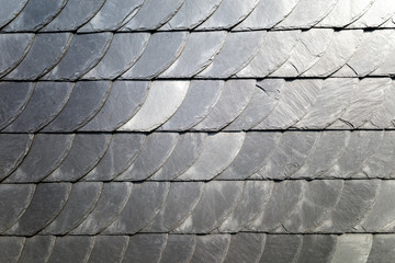 slate tiles at exterior wall of an old house