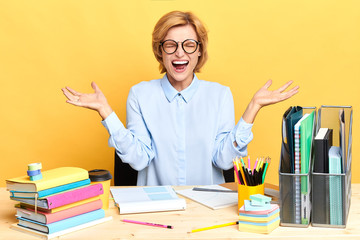 crazy funny woman screaming nervously while sitting at the table, secretary hates her work and boss, negative feeling and emotion, student cannot prepare for exams