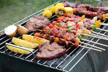 Barbeque Grill Street Food in thailand,Eat outdoors in a happy family.