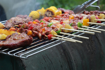 Barbeque Grill Street Food in thailand,Eat outdoors in a happy family.