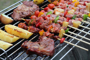 Barbeque Grill Street Food in thailand,Eat outdoors in a happy family.