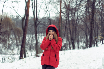 December walk with a young pretty blonde
