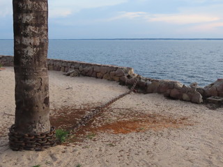old wooden breakwater in sea
