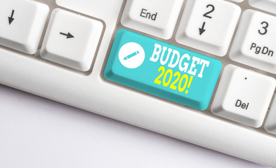 Handwriting text Budget 2020. Conceptual photo estimate of income and expenditure for next or current year White pc keyboard with empty note paper above white background key copy space