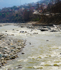 rafting near Kullu town in India.  Himalayas
