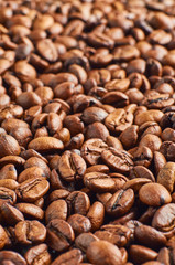 Roasted coffee beans close-up, can be used as a different background.