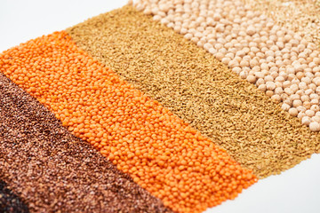 buckwheat, red lentil and chickpea isolated on white