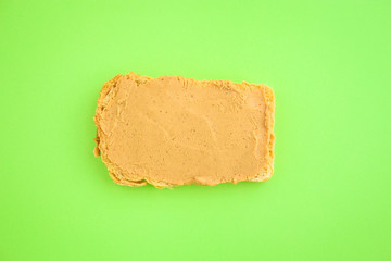 peanut butter sandwich (tasty snack, bread or toast buttered with nut butter) menu concept. food background. copy space. Top viev