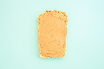 peanut butter sandwich (tasty snack, bread or toast buttered with nut butter) menu concept. food background. copy space. Top viev