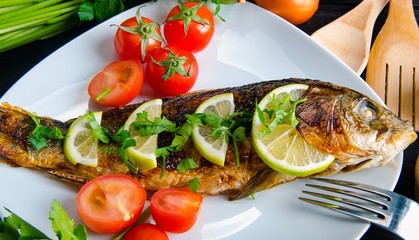 Fried fish served on the plate