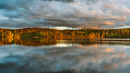 The sunset view by the lakeside next to a campsite Koli Freetime Oy in Finland Lakeland