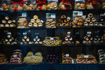 Fototapeta premium Italian sweets and desserts, typical from Sicily and Tuscany, Italy. Food guide picture including cannoli, cantucci, biscotti and other cookies and biscuits.
