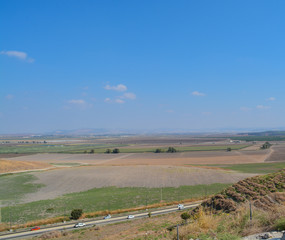 Obraz premium The view over Jezreel Valley at Tel Megiddo. Known as The Valley of Armageddon