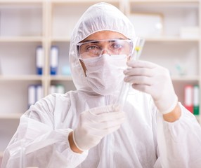 The biotechnology scientist chemist working in lab