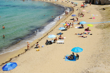 Beautiful view of Beach of Purity (purità) with tourists. Gallipoli, Italy