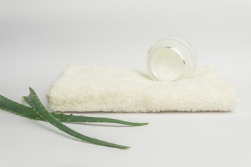 Organic cream with aloe vera extract  on white background