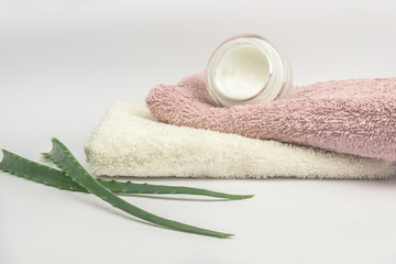 Organic cream with aloe vera extract  on white background
