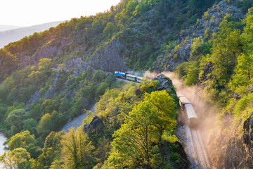 old steam train running through the valley