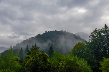 Fog in the Krpathian mountains, view of the top.