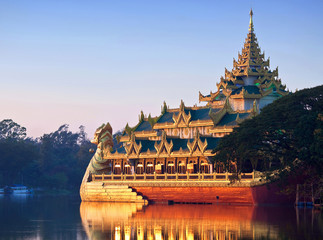 Karaweik barge at sunset on Kandawgyi Lake in Yangon, Myanmar