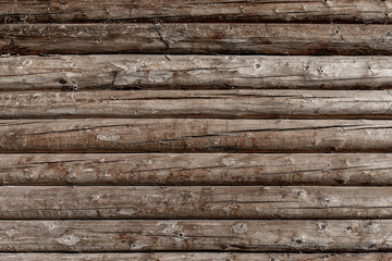 parallel, weathered wooden logs background
