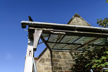 Part of a ruined porch Bangour Village Hospital; Dechmont, near Livingston, Scotland.  The site has...