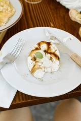 Burrata with sauce served at the restaurant