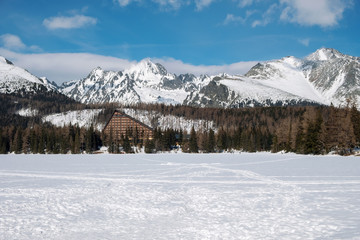 Fototapeta na wymiar Beautiful winter landscape at Strbske Pleso lake in high Tatras mountains
