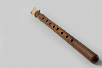 Duduk musical instrument on a white background © Nariman