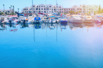 Fototapeta na wymiar Sea port with beautiful ships and boats on a sunny day, copy space - Tunisia, Sousse, El Kantaoui 06 19 2019