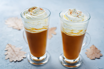 Pumpkin spice latte with whipped cream and cinnamon