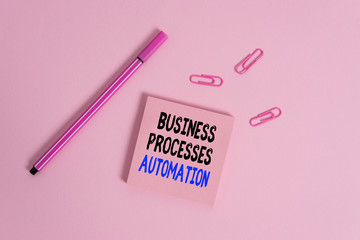 Writing note showing Business Processes Automation. Business concept for performed to achieve digital transformation Colored sticky note clips binders gathered pen trendy cool background