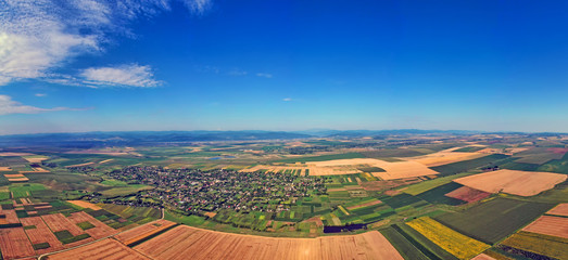 Summer panorama aerial view of fields