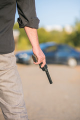 criminal with gun replica about to commit a crime