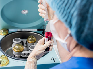 Platelet-Rich plasma preparation. Plasma in syringe. Centrifuge.