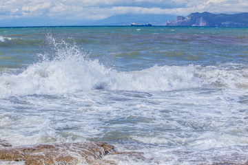 Storm on the sea coast in the summer.