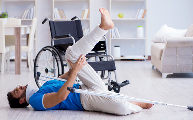 Fototapeta premium Injured young man recovering at home