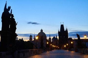 Fototapeta premium Prague - Charles Bridge and Old Town area at sunrise