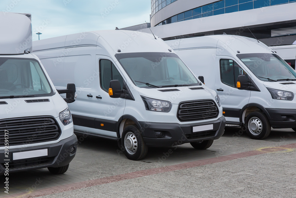 Sticker minibuses and vans outside